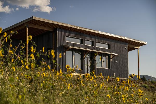 High-performance building envelope home with prefabricated panelized construction