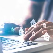 Person searching for house online