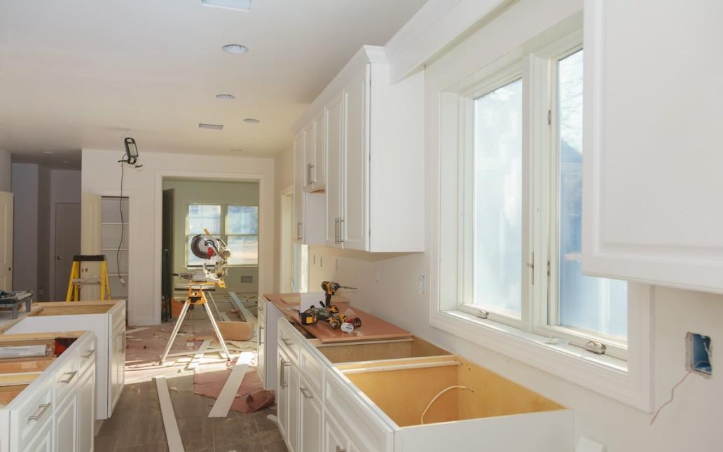 Kitchen cabinets and island in the middle of a remodel project