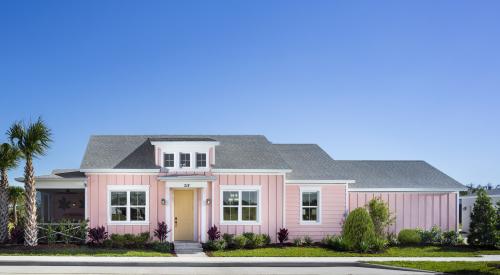 Pink exterior of Conch Collection Cottage (Alloha model) by Minto Communities