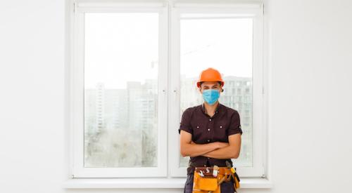 Worker in mask cornavirus pandemic