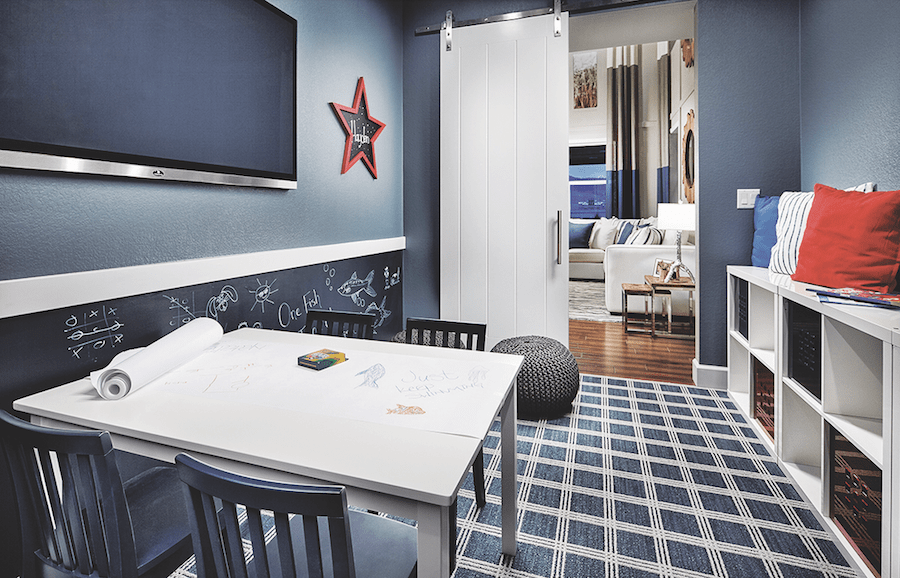 Kid-friendly home design in action: a kid-friendly space off the great room at Leyden Rock from Epic Homes.