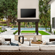 Outdoor living features that are on-trend for homebuyers include outdoor TVs like this one