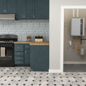 Rheem high-efficiency condensing water heater installed in closet near the kitchen