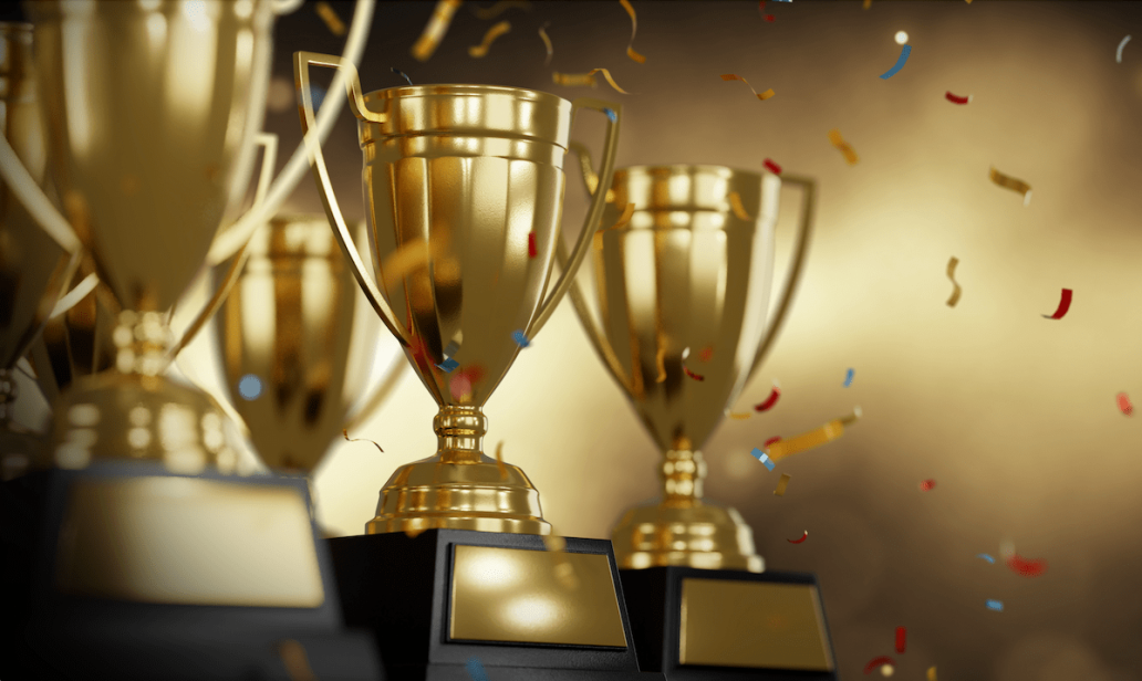 Group of gold trophies for home builder excellence